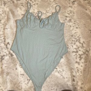 light blue spaghetti strap bodysuit